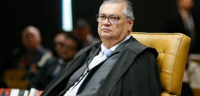 Dino diz que mandato parlamentar exige presença física e recado atinge Eduardo Bolsonaro